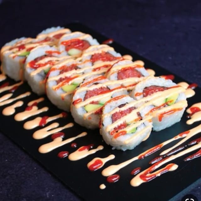 <Spicy Salmon Roll* $12.